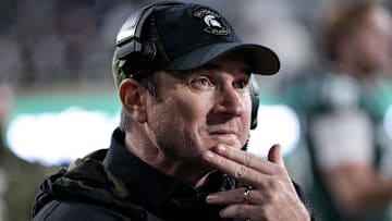 Nov 15, 2025; East Lansing, Michigan, USA; Michigan State head coach Jonathan Smith watches his team play against Penn State from the sidelines in the third quarter at Spartan Stadium. Mandatory Credit: Brendan Mullin-Imagn Images