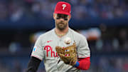 Jun 3, 2025; Toronto, Ontario, CAN; Philadelphia Phillies first baseman Bryce Harper (3) walks towards the dugout after the third out against the Toronto Blue Jays during the fourth inning at Rogers Centre. 