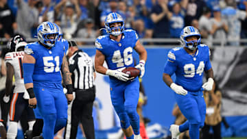 Sep 14, 2025; Detroit, Michigan, USA; Detroit Lions linebacker Jack Campbell (46) carries the ball after a fumble recover against the Chicago Bears during the first quarter of the game at Ford Field. Mandatory Credit: Lon Horwedel-Imagn Images