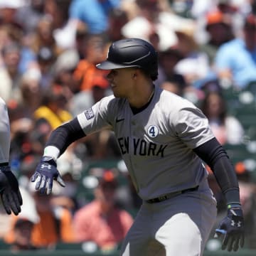 Jun 2, 2024; San Francisco, California, USA; New York Yankees right fielder Juan Soto (right) celebrates with center fielder Aaron Judge (99) after hitting a home run against the San Francisco Giants during the first inning at Oracle Park.