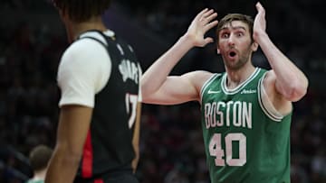 Boston Celtics center Luke Kornet (40) reacts during the second half against to being called for a foul at Moda Center. Man