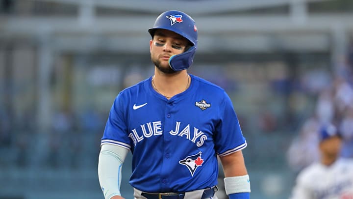 Oct 27, 2025; Los Angeles, California, USA; Toronto Blue Jays second baseman Bo Bichette (11) reacts in the second inning against the Los Angeles Dodgers during game three of the 2025 MLB World Series at Dodger Stadium. Mandatory Credit: Jayne Kamin-Oncea-Imagn Images