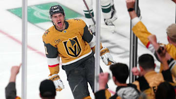 Apr 20, 2025; Las Vegas, Nevada, USA; Vegas Golden Knights center Brett Howden (21) celebrates after scoring a goal against the Minnesota Wild during the third period of game one of the first round of the 2025 Stanley Cup Playoffs at T-Mobile Arena. Mandatory Credit: Stephen R. Sylvanie-Imagn Images