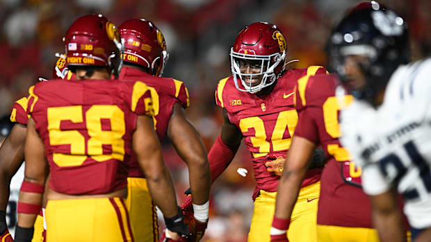 Sep 7, 2024; Los Angeles, California, USA; USC Trojans defensive end Braylan Shelby (34) celebrates against Utah State Aggies