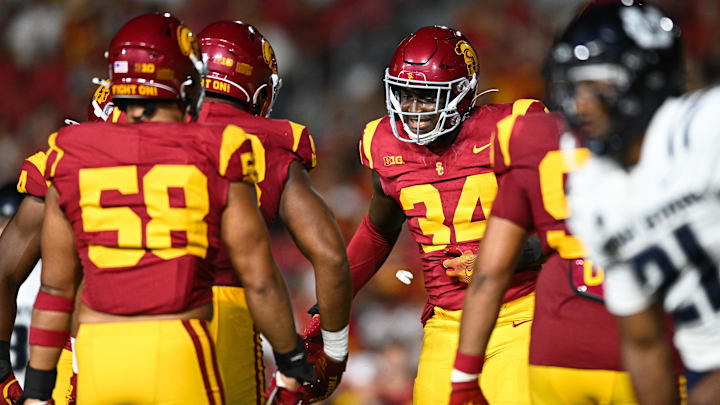 Sep 7, 2024; Los Angeles, California, USA; USC Trojans defensive end Braylan Shelby (34) celebrates after Utah State Aggies quarterback Bryson Barnes (16) (not pictured) is sacked during the third quarter at United Airlines Field at Los Angeles Memorial Coliseum.