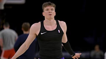 Apr 4, 2025; Los Angeles, California, USA;  Los Angeles Lakers guard Dalton Knecht (4) warms up prior to the game against the New Orleans Pelicans at Crypto.com Arena. Mandatory Credit: Jayne Kamin-Oncea-Imagn Images