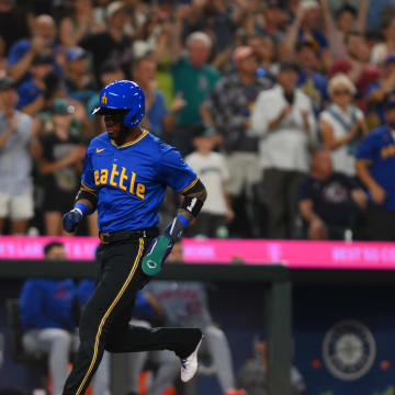 Seattle Mariners center fielder Victor Robles (10) scores a run against the New York Mets during the seventh inning at T-Mobile Park on Aug 9.