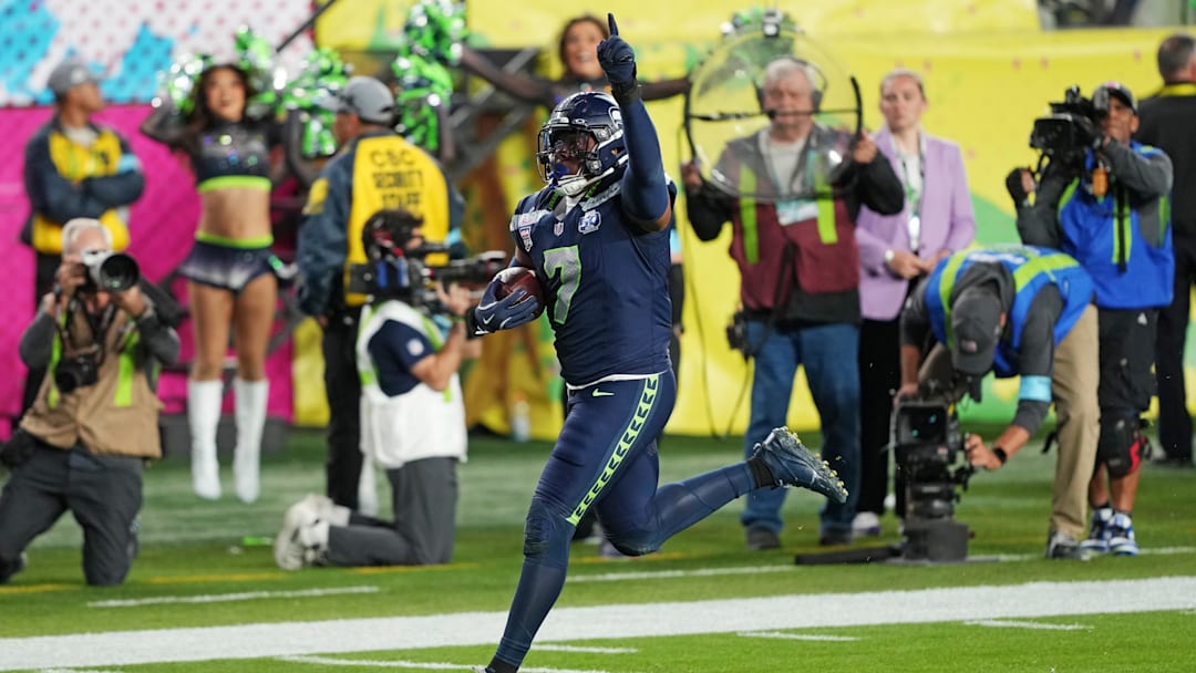 Feb 8, 2026; Santa Clara, CA, USA; Seattle Seahawks linebacker Uchenna Nwosu (7) scores a touch down during the fourth quarter against the New England Patriots in Super Bowl LX at Levi's Stadium. Mandatory Credit: Darren Yamashita-Imagn Images