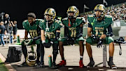 The Basha Bears sit on the sidelines during a game against the Hamilton Huskies at Basha High School in Chandler on Oct. 24, 2025.