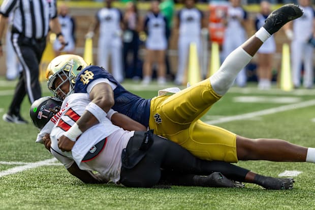 Boubacar Traore makes a sack against NC Stat