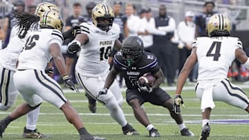 Northwestern Wildcats running back Joseph Himon II (6) runs the ball 