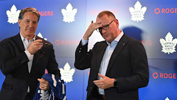 Jun 1, 2023; Toronto, Ontario, CANADA; Toronto Maple Leafs new general manager Brad Treliving is introduced by club president Brendan Shanahan (left) at a press conference at Scotiabank Arena. Mandatory Credit: Dan Hamilton-Imagn Images