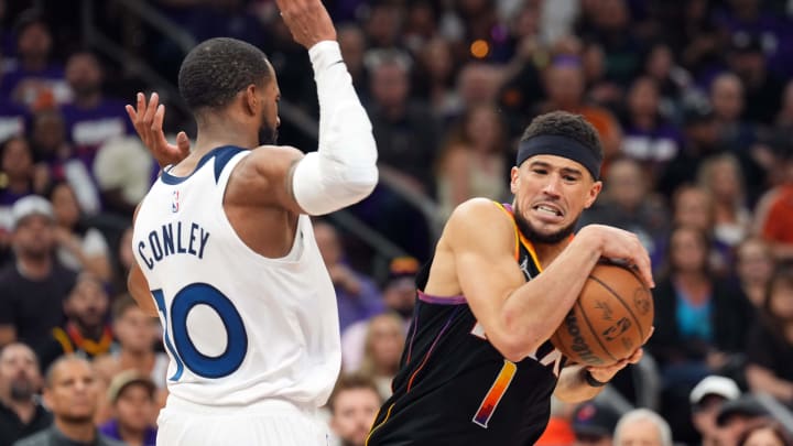 Apr 26, 2024; Phoenix, Arizona, USA; Phoenix Suns guard Devin Booker (1) drives against Minnesota