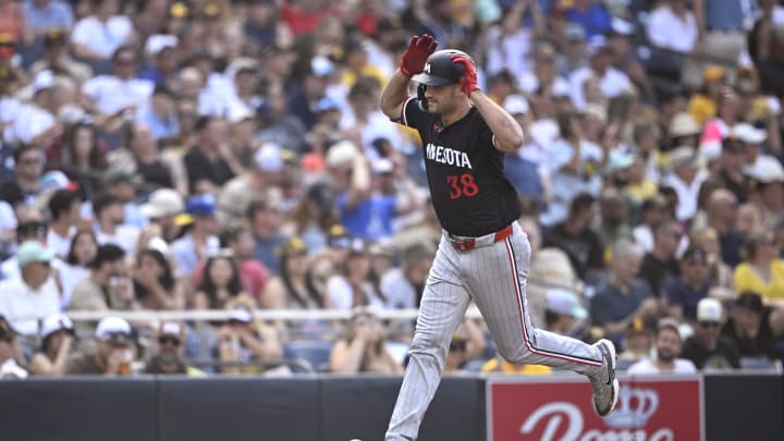 Minnesota Twins right fielder Matt Wallner (38) rounds the bases after hitting a three-run home run against the San Diego Padres during the fourth inning at Petco Park in San Diego on Aug. 21, 2024. 