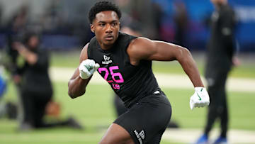 Feb 28, 2025; Indianapolis, IN, USA;  Tulane defensive back Caleb Ransaw (DB26) participates in drills during the 2025 NFL Combine at Lucas Oil Stadium. 