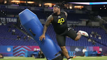 Feb 27, 2025; Indianapolis, IN, USA; Ohio State defensive lineman Tyleik Williams (DL40) participates in drills during the 2025 NFL Combine at Lucas Oil Stadium. Mandatory Credit: Kirby Lee-Imagn Images