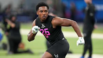 Feb 28, 2025; Indianapolis, IN, USA;  Tulane defensive back Caleb Ransaw (DB26) participates in drills during the 2025 NFL Combine at Lucas Oil Stadium.