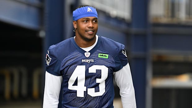 New England Patriots defensive end Bradyn Swinson (43) walks to the practice fields. New England Patriots defensive end Bradyn Swinson (43) walks to the practice fields.