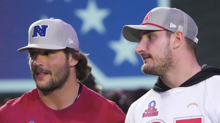 NFC defensive end Nick Bosa of the San Francisco 49ers (left) with AFC linebacker Joey Bosa of the Los Angeles Chargers