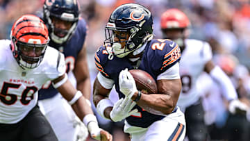 Aug 17, 2024; Chicago, Illinois, USA; Chicago Bears running back Khalil Herbert (24) runs the ball against the Cincinnati Bengals during the first quarter at Soldier Field.