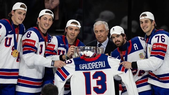 Switzerland v USA - 2025 IIHF Ice Hockey World Championship Final, Clayton Keller, Zach Werenski, Conor Garland, Tage Thompson, Brady Skjei all with the World Championship trophy, while holding  the late Johnny Gaudreau's team USA jersey