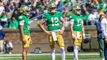 Apr 12, 2025; Notre Dame, IN, USA; Notre Dame Fighting Irish quarterback Kenny Minchey (8), Notre Dame Fighting Irish quarterback Blake Hebert (12), Notre Dame Fighting Irish quarterback CJ Carr (13) watch during the Blue-Gold game at Notre Dame Stadium. Mandatory Credit: Michael Caterina-Imagn Images