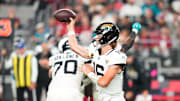 Nov 23, 2025; Glendale, Arizona, USA;  Jacksonville Jaguars quarterback Trevor Lawrence (16) throws a pass during the fourth quarter against the Arizona Cardinals at State Farm Stadium. Mandatory Credit: Joe Camporeale-Imagn Images