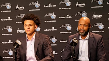 Jun 24, 2022; Orlando, Florida, USA; Orlando Magic first overall draft pick Paolo Banchero (left) and coach Jamahl Mosley (right) during a press conference at the Amway Center. Mandatory Credit: Nathan Ray Seebeck-Imagn Images