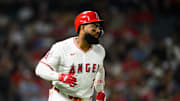 Sep 25, 2025; Anaheim, California, USA; Los Angeles Angels right fielder Jo Adell (7) runs after hitting a single during the sixth inning against the Kansas City Royals at Angel Stadium. Mandatory Credit: William Liang-Imagn Images
