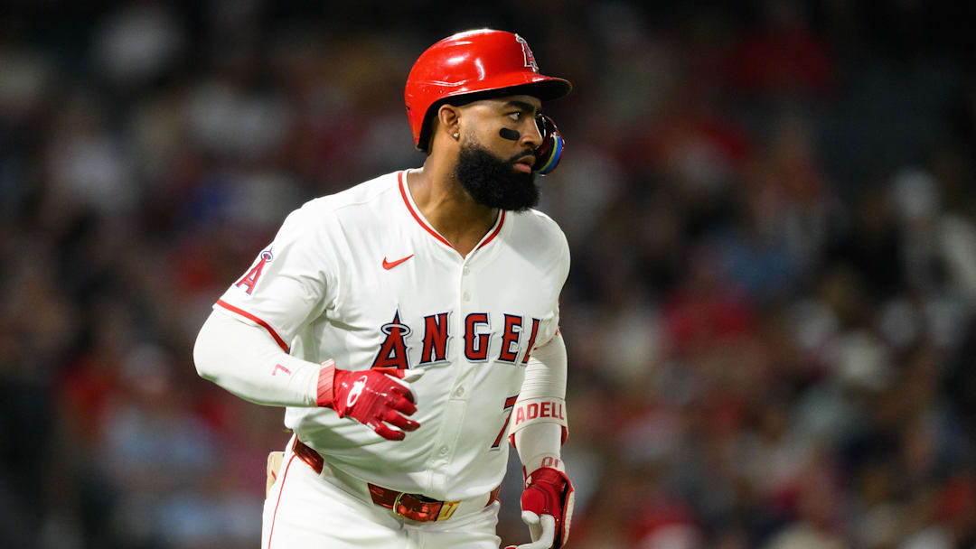 Sep 25, 2025; Anaheim, California, USA; Los Angeles Angels right fielder Jo Adell (7) runs after hitting a single during the sixth inning against the Kansas City Royals at Angel Stadium. Mandatory Credit: William Liang-Imagn Images