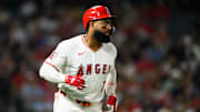 Sep 25, 2025; Anaheim, California, USA; Los Angeles Angels right fielder Jo Adell (7) runs after hitting a single during the sixth inning against the Kansas City Royals at Angel Stadium. Mandatory Credit: William Liang-Imagn Images