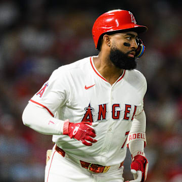 Sep 25, 2025; Anaheim, California, USA; Los Angeles Angels right fielder Jo Adell (7) runs after hitting a single during the sixth inning against the Kansas City Royals at Angel Stadium. Mandatory Credit: William Liang-Imagn Images