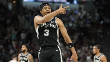 Mar 29, 2024; San Antonio, Texas, USA; San Antonio Spurs forward Keldon Johnson (3) reacts during the second half against the New York Knicks at Frost Bank Center. Mandatory Credit: Scott Wachter-USA TODAY Sports