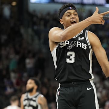 Mar 29, 2024; San Antonio, Texas, USA; San Antonio Spurs forward Keldon Johnson (3) reacts during the second half against the New York Knicks at Frost Bank Center. Mandatory Credit: Scott Wachter-Imagn Images