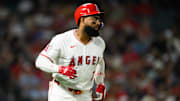 Sep 25, 2025; Anaheim, California, USA; Los Angeles Angels right fielder Jo Adell (7) runs after hitting a single during the sixth inning against the Kansas City Royals at Angel Stadium. Mandatory Credit: William Liang-Imagn Images