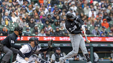 Apr 5, 2025; Detroit, Michigan, USA; Chicago White Sox outfielder Luis Robert Jr. (88) picks up an RBI on a fielders choice double play in the fifth inning against the Detroit Tigers at Comerica Park. Mandatory Credit: David Reginek-Imagn Images