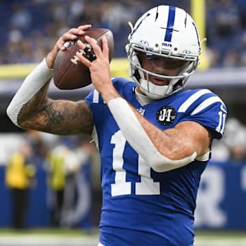 Oct 26, 2025; Indianapolis, Indiana, USA;  Indianapolis Colts wide receiver Michael Pittman Jr. (11) warms up before the game against the Tennessee Titans at Lucas Oil Stadium. 