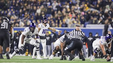 Oct 25, 2025; Morgantown, West Virginia, USA; Texas Christian University Horned Frogs quarterback Josh Hoover (10) changes the play at the line of scrimmage during the third quarter against the West Virginia Mountaineers at Milan Puskar Stadium. Mandatory Credit: Ben Queen-Imagn Images