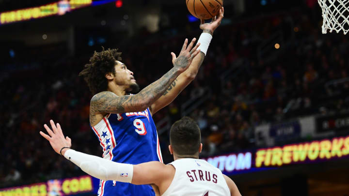 Mar 29, 2024; Cleveland, Ohio, USA; Philadelphia 76ers guard Kelly Oubre Jr. (9) drives to the basket against Cleveland Cavaliers guard Max Strus (1) during the first half at Rocket Mortgage FieldHouse. Mandatory Credit: Ken Blaze-USA TODAY Sports
