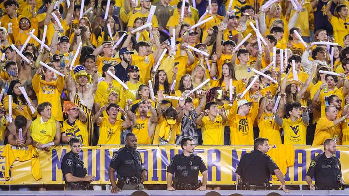 Sep 26, 2026; Morgantown, West Virginia, USA;  West Virginia Mountaineers fans cheer during the first quarter against the Oklahoma State Cowboys at Milan Puskar Stadium.  Mandatory Credit: Ben Queen-Imagn Images