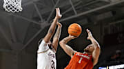 Mar 5, 2025; Chestnut Hill, Massachusetts, USA; Clemson Tigers guard Chase Hunter (1)  shoots against Boston College Eagles forward Elijah Strong (31) during the second half at Conte Forum. Mandatory Credit: Eric Canha-Imagn Images