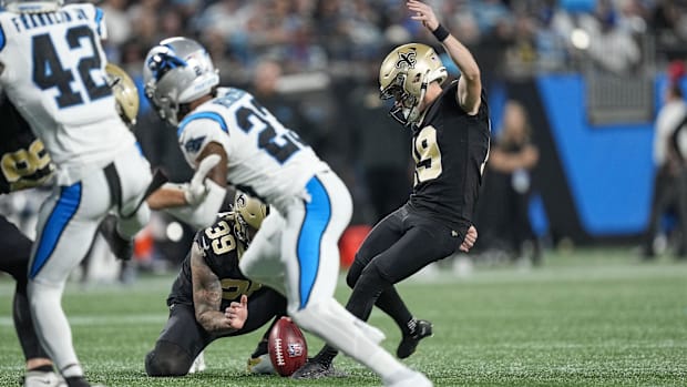 New Orleans Saints place kicker Blake Grupe (19) adds an extra point against the Carolina Panthers 