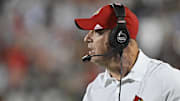 Sep 5, 2025; Louisville, Kentucky, USA;  Louisville Cardinals head coach Jeff Brohm watches from the sideline during the second half against the James Madison Dukes at L&N Federal Credit Union Stadium. Mandatory Credit: Jamie Rhodes-Imagn Images