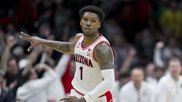 Mar 23, 2025; Seattle, WA, USA;  Arizona Wildcats guard Caleb Love (1) reacts against the Oregon Ducks in the second half at Climate Pledge Arena. Mandatory Credit: Stephen Brashear-Imagn Images