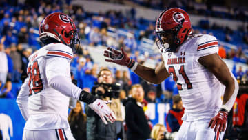 South Carolina football defensive back Nick Emmanwori (21, now 7) celebrating with former teammate Darius Rush