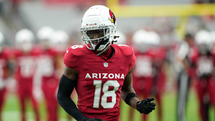 Aug 10, 2024; Glendale, Arizona, USA; Arizona Cardinals wide receiver Marvin Harrison Jr. (18) warms up before facing the New Orleans Saints at State Farm Stadium. Mandatory Credit: Joe Camporeale-Imagn Images