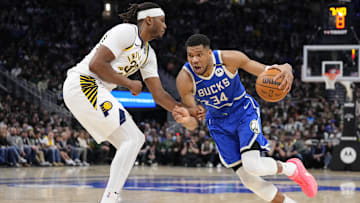 Mar 15, 2025; Milwaukee, Wisconsin, USA;  Milwaukee Bucks forward Giannis Antetokounmpo (34) drives for the basket against Indiana Pacers center Myles Turner (33) during the fourth quarter at Fiserv Forum. Mandatory Credit: Jeff Hanisch-Imagn Images