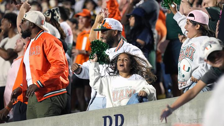 Oct 5, 2024; Berkeley, California, USA; Miami Hurricanes fans cheer during the fourth quarter against the California Golden Bears at California Memorial Stadium. Mandatory Credit: Darren Yamashita-Imagn Images