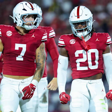 Sep 7, 2024; Norman, Oklahoma, USA; Oklahoma Sooners linebacker Lewis Carter (20) celebrates with Oklahoma Sooners linebacker Jaren Kanak (7) during the second half against the Houston Cougars at Gaylord Family-Oklahoma Memorial Stadium.