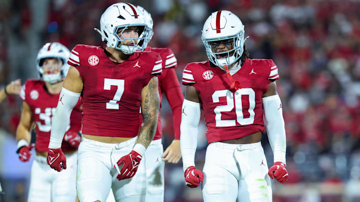 Sep 7, 2024; Norman, Oklahoma, USA; Oklahoma Sooners linebacker Lewis Carter (20) celebrates with Oklahoma Sooners linebacker Jaren Kanak (7) during the second half against the Houston Cougars at Gaylord Family-Oklahoma Memorial Stadium.